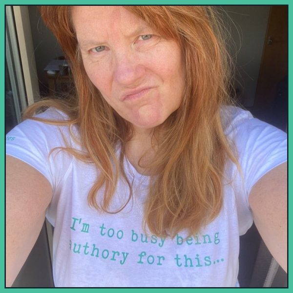 Alexa wearing an I’m too busy being authory for this… T-Shirt in white